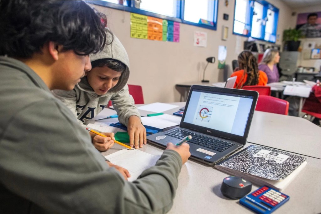 Photo of students engaging in math in classroom